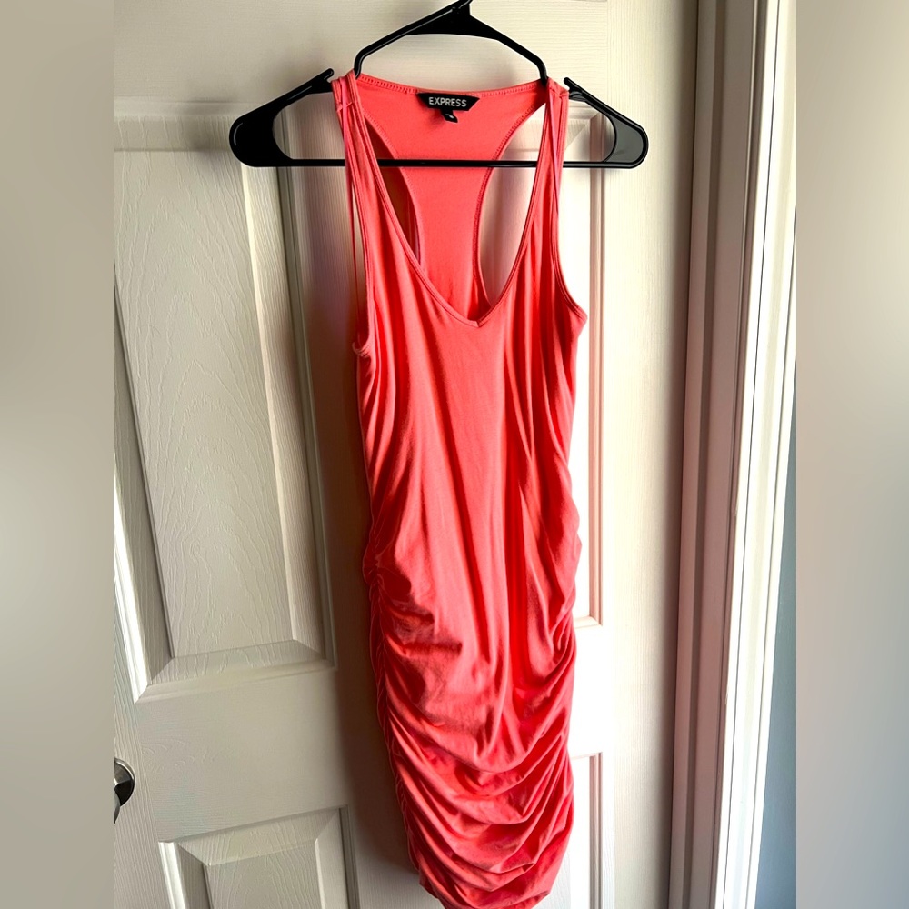 Beautiful coral pink dress with ruched sides!